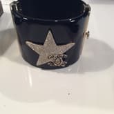 Chanel Black Gold Star Cuff — image 1