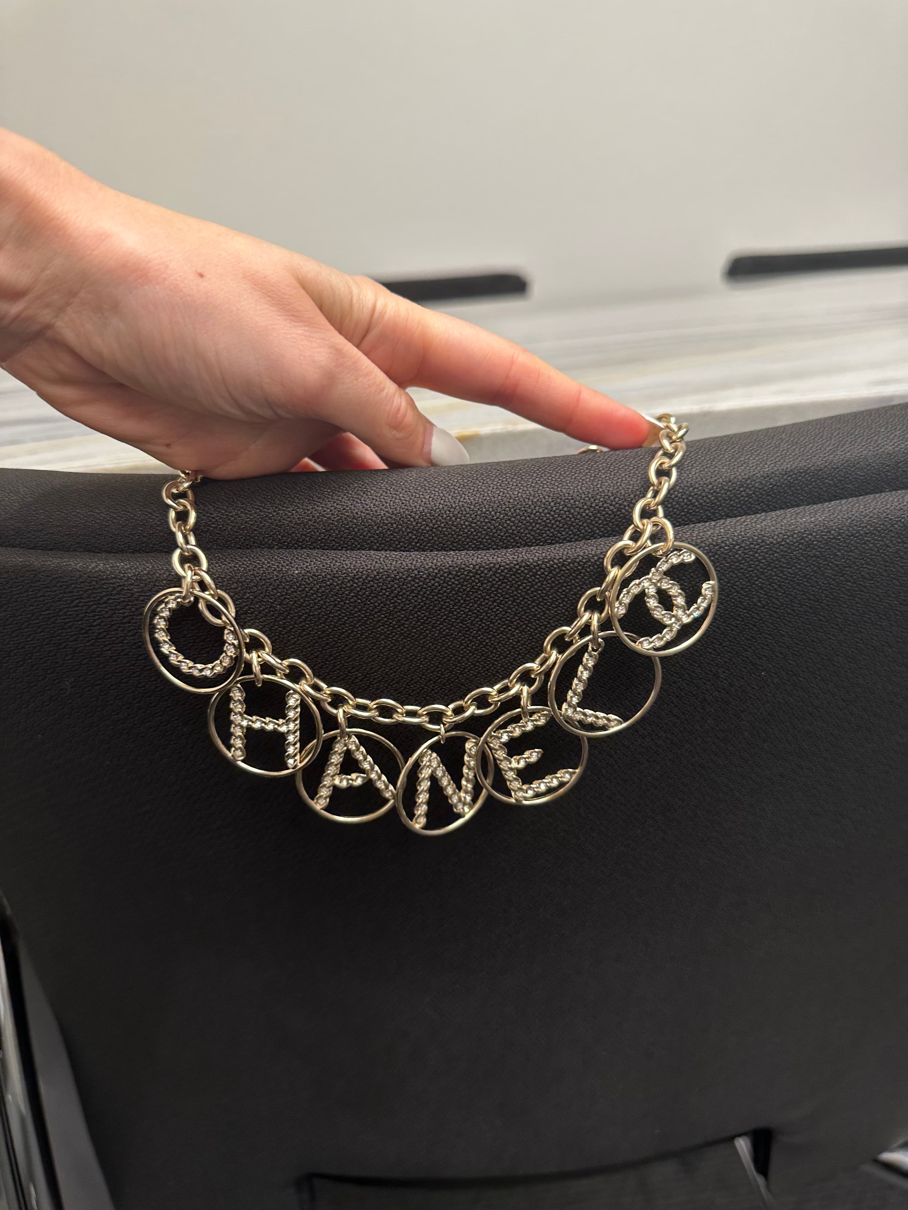 Chanel Yellow Gold Logo Necklace